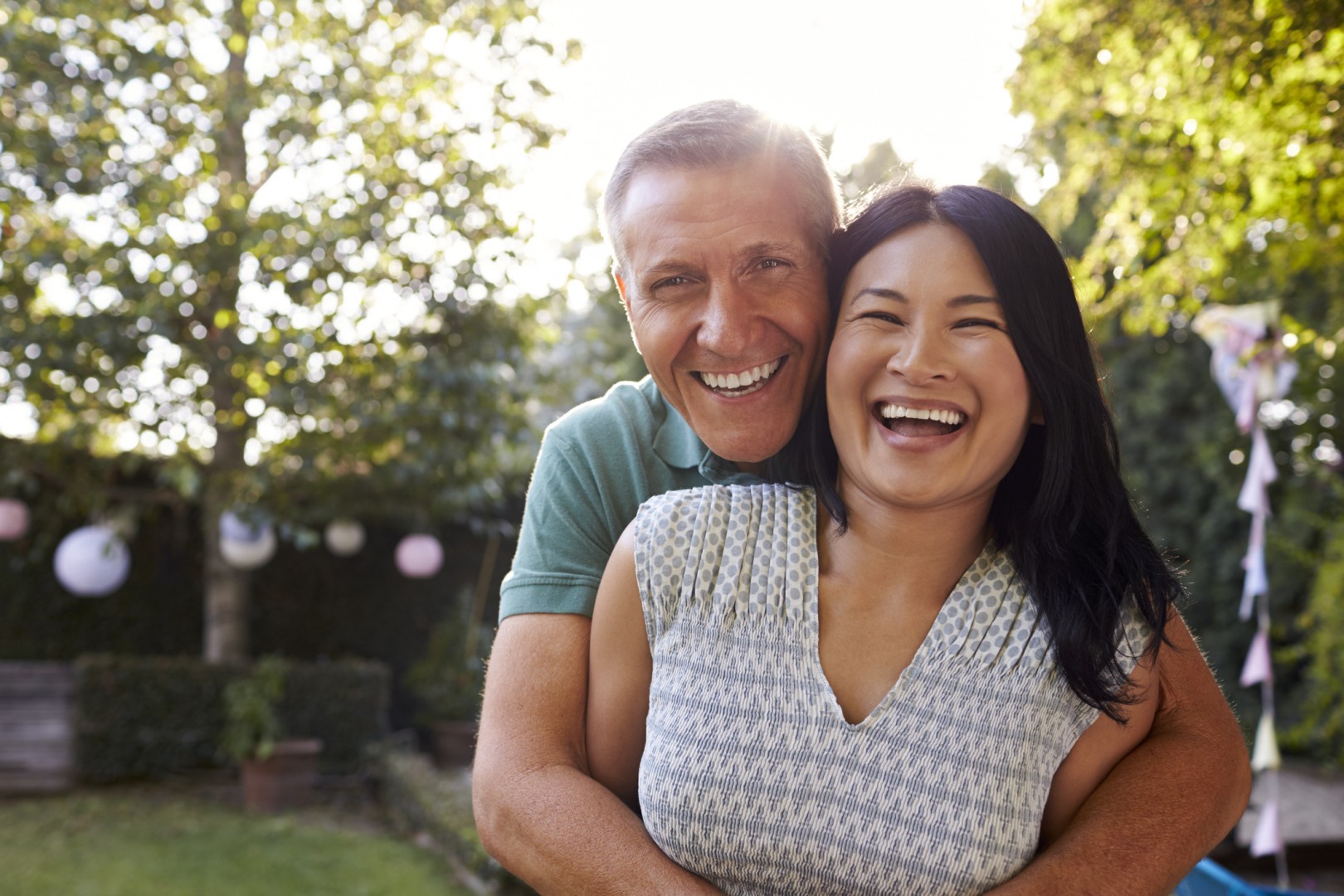 Couple hugging and smiling